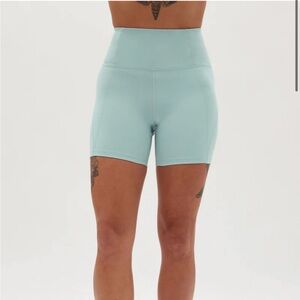 Girlfriend Collective High Rise Run Short with Pockets in Glass